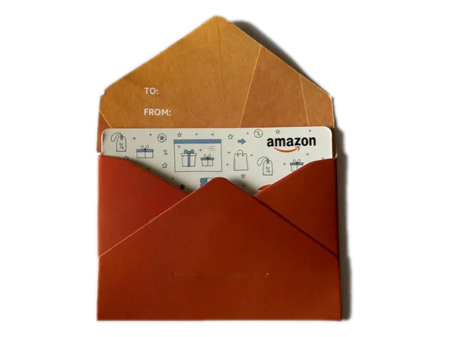 Orange envelope with white paper Amazon gift card